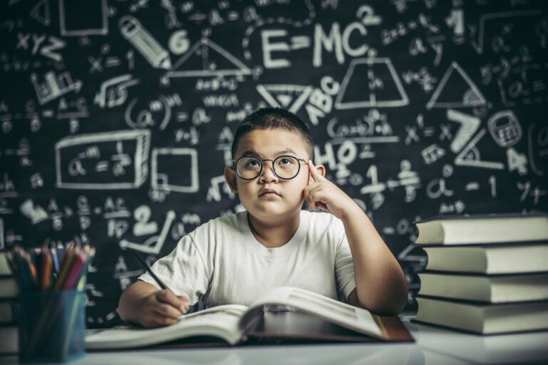 boys-with-glasses-write-books-think-classroom